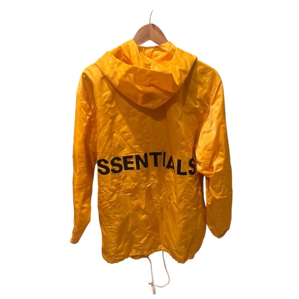 Fear of God Essentials Yellow Jacket in a Men's size Small